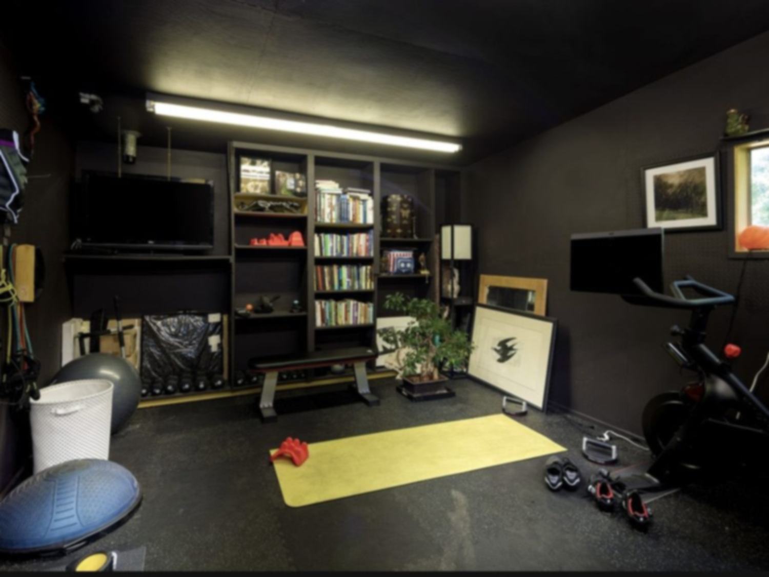 A home gym built into a media room