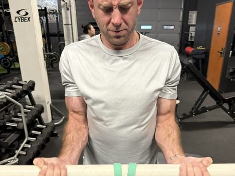 Banded overhead work during a strength session